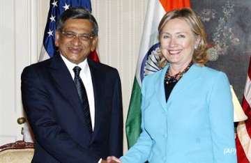 hillary raises nuclear liability bill issue with krishna