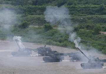 north korea warns of war with south korea after artillery fire