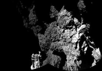 philae probe drills into comet turns toward light