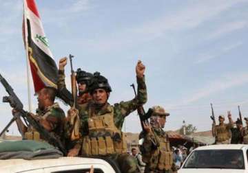 iraqi forces battle with is enters fourth day