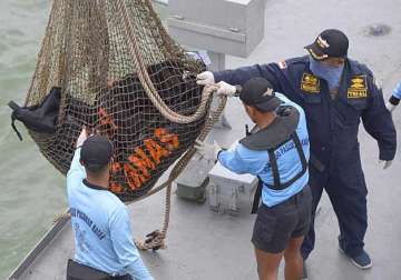 airasia crash searchers may have located tail of crashed plane