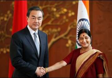 sushma swaraj meets chinese counterpart raises lakhvi issue