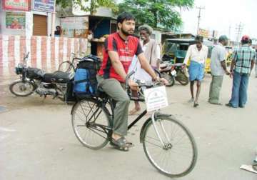 indian cyclist reaches qatar on 200 000 km trip