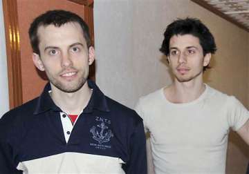 iran releases 2 americans jailed as spies
