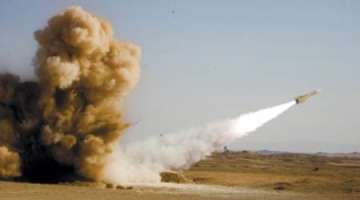 iran test fires 14 missiles