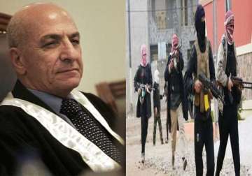 iraq crisis judge who sentenced saddam hussein to death executed