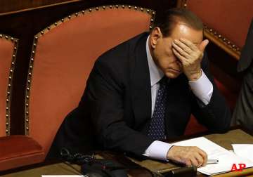 italian court sets two year political ban for berlusconi