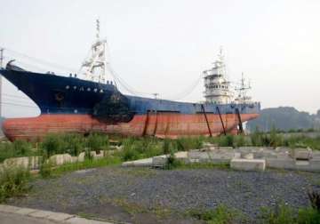 japan city votes to destroy tsunami ship landmark