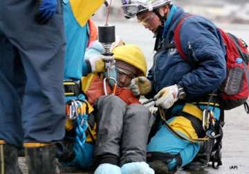 japan disaster death toll to top 18 000
