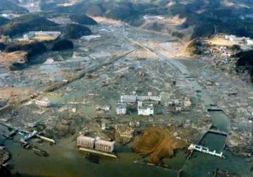 japan suspends 35 tsunami reconstruction projects