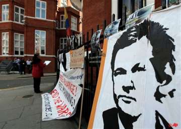 julian assange not leaving embassy says wikileaks