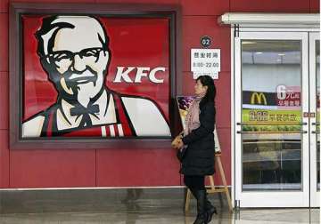 kfc pizza hut owner says china food supplier scandal hurting sales