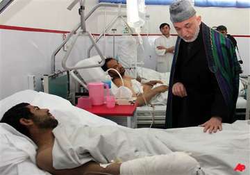 kabul hits back at pakistan over shrine bomb