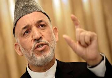 karzai arrives in pakistan on day long visit