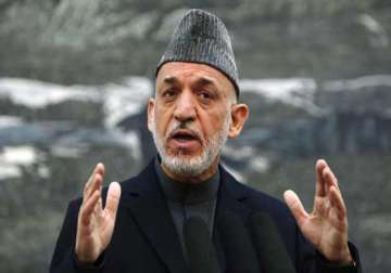 karzai extends pakistan visit