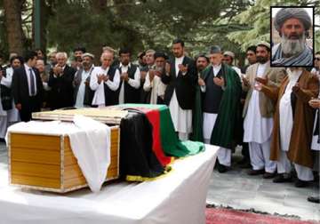 killer of karzai s aide received calls from pakistan