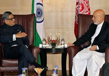 krishna meets karzai discusses peace aid to afghanistan