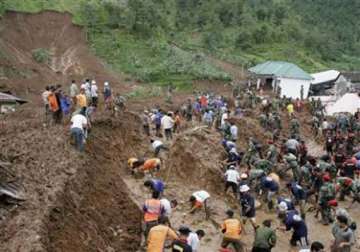 landslides leave 12 dead 14 missing in indonesia