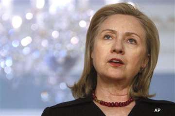 leave libya as soon as possible clinton tells gaddafi