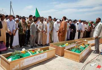 libya buries 11 imams killed in nato strike