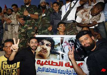 libya declared free but gadhafi death questioned