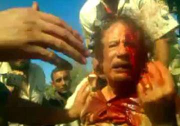 libyan puts up gaddafi s bloodied shirt ring for 2 million auction