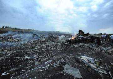 mh17 crash forensic experts gather material to identify victims