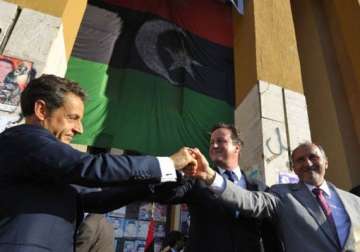 ntc forces in sirte as cameron sarkozy hail free libya