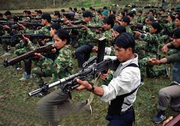 nepal maoists hand over weapons to special committee