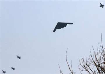 war clouds hover as north korea points rockets towards us bases us b 2 stealth bombers carry out drill