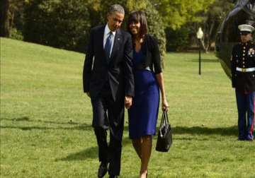obama says fear of his wife keeps him from smoking