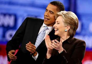 obama lauds hillary clinton as she prepares to leave
