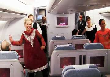on helsinki delhi flight finnair cabin crew do the om shanti om dance