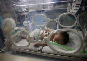 orphaned before her birth baby girl born from dead mother in gaza