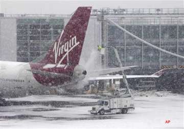 over 250 flights cancelled at heathrow due to heavy snow thousands stranded