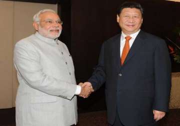 pm modi meets chinese president presses for solution to boundary issue