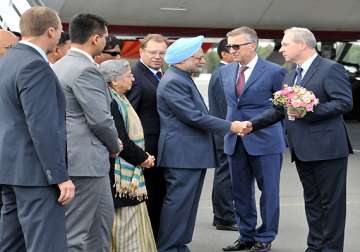 pm arrives in russia for bilateral talks