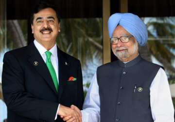 pm gilani greet each other at seoul summit