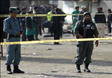 59 dead in afghan shrine blasts on shiite holy day