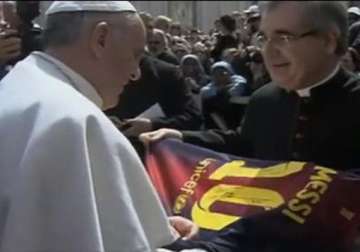 pope francis receives signed jersey from messi