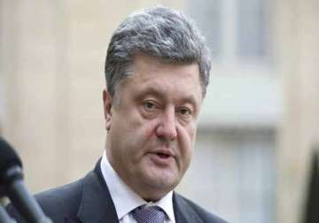 poroshenko merkel call for peaceful settlement of ukraine crisis