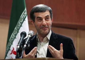 protege of iran s ahmadinejad vows comeback