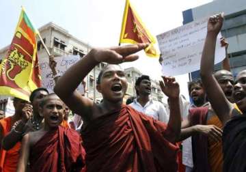 protests in colombo over attacks on lankan monks in tamil nadu
