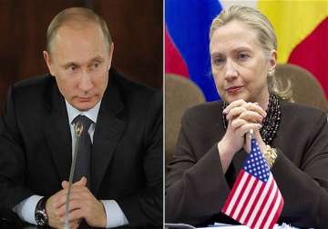 putin accuses clinton of encouraging protesters