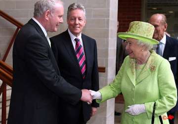 queen in historic handshake with her cousin s killer