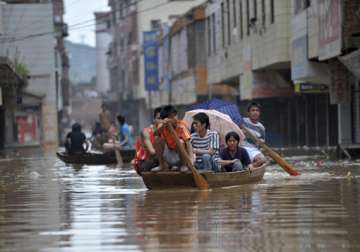 rescuers continue relief work in flood hit liaoning province