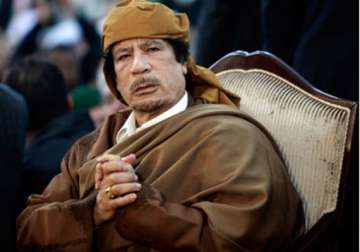 residents flee gaddafi s hometown as assaults on hold