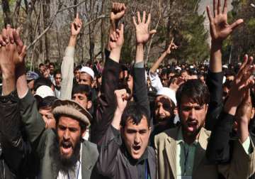 rights body flays kabul for protest break up