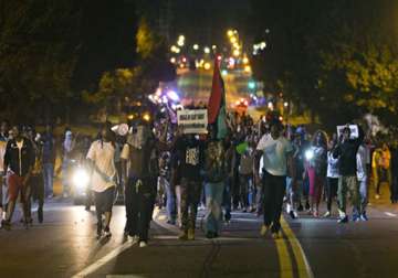 riots continue in us city after teenager s death