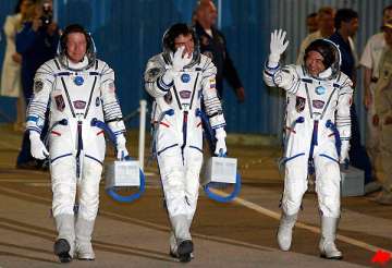 russian three man crew leaves for iss